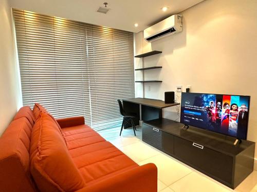 Μια τηλεόραση ή/και κέντρο ψυχαγωγίας στο Casa Ipê - Beira lago- Lake View