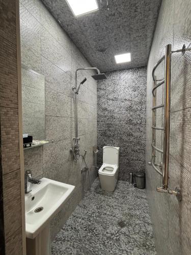Koupelna v ubytování Mirvarim Hotel