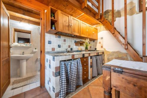 Η κουζίνα ή μικρή κουζίνα στο Villa Claudia - Calasetta