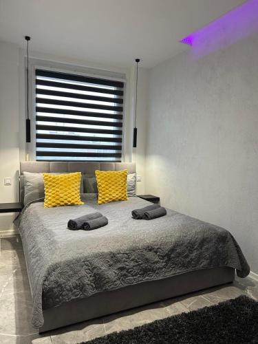 Katil atau katil-katil dalam bilik di Block Home Apartman