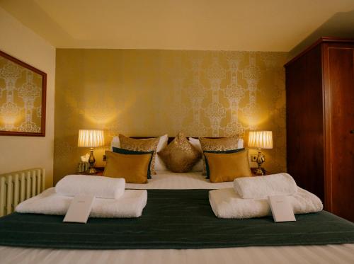 Letto o letti in una camera di The Old Palace Lodge