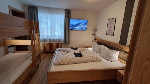 Postel nebo postele na pokoji v ubytování Apart Austria