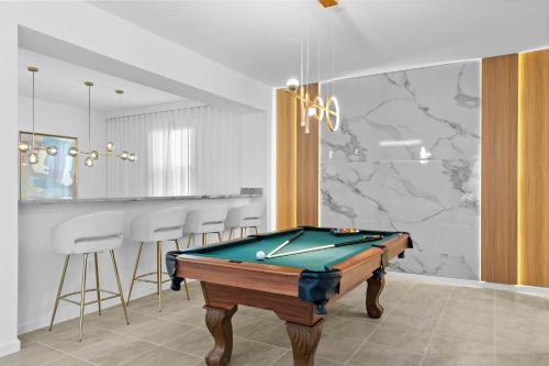 Ultimate Luxury Themed Bedrooms Game Room Pool photo 25