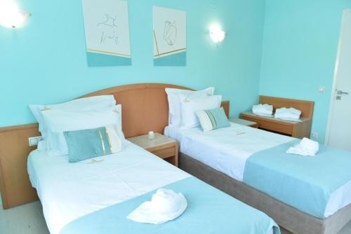 Ένα ή περισσότερα κρεβάτια σε δωμάτιο στο Christianna Apartments by PosarelliVillas