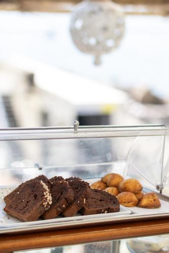 a tray of different types of bread and pastries at Hotel Aurora in Amalfi