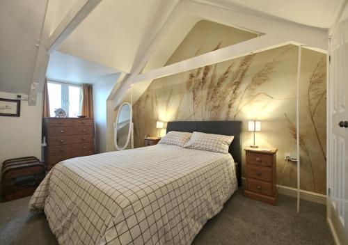 Ένα ή περισσότερα κρεβάτια σε δωμάτιο στο Calleron