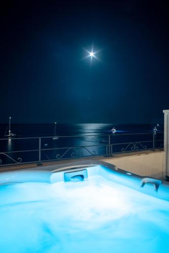 a bath tub at night with a star in the sky at Hotel Aurora in Amalfi
