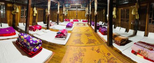 a room filled with lots of pillows on a train at Bac Son Homestay in Bắc Sơn