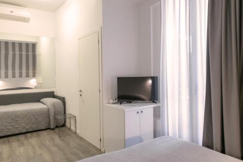 Perla Verde Hotelにあるベッド