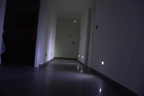 an empty room with a hallway with a white wall at Civico 83 in Reggio Calabria