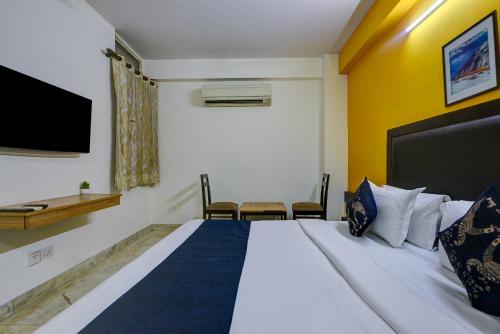 Ένα ή περισσότερα κρεβάτια σε δωμάτιο στο Hotel Bijwasan Near Yashobhomi