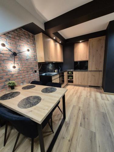 Kuchyňa alebo kuchynka v ubytovaní Asti Apartamenty Centrum Stargard