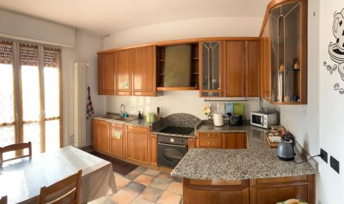 Kuchyň nebo kuchyňský kout v ubytování Grandi Cime Guest House