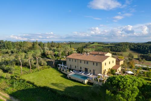 an aerial view of a large house with a yard at Villa Petriolo - Small Luxury Hotels of the World in Cerreto Guidi