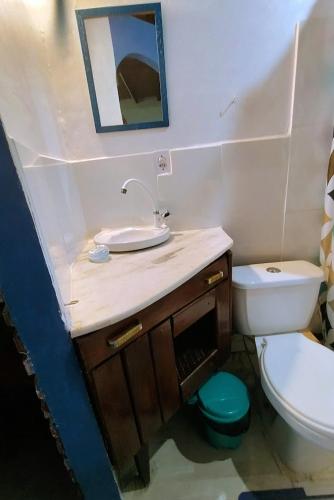 a bathroom with a sink and a toilet at Pousada Maravilha in Itacaré