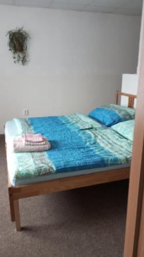 Cama o camas de una habitación en Ubytování Lumik