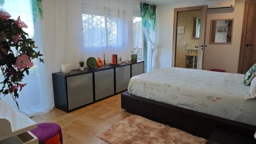 Postel nebo postele na pokoji v ubytování INSPIRA MAISON Montaña y Mar