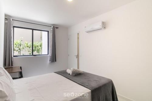 Katil atau katil-katil dalam bilik di MCB - Apartamentos com piscina prox. da Praia