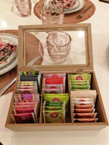 a wooden box filled with different types of food at Alpenblumal in Bad Goisern
