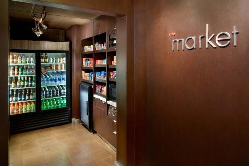 a market store with a large refrigerator and a grocery store at Courtyard by Marriott Raleigh Cary in Cary