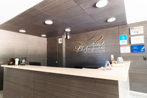 Certifikát, hodnocení, plakát nebo jiný dokument vystavený v ubytování Hotel El Aeropuerto