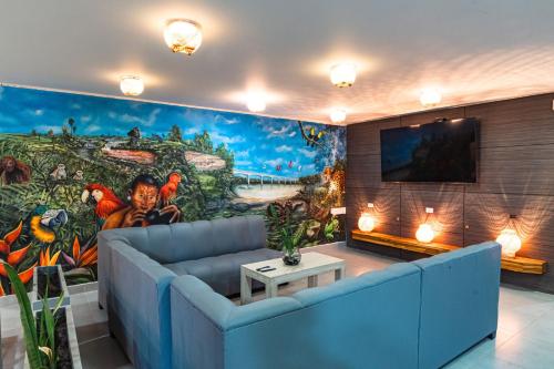 TV a/nebo společenská místnost v ubytování Hotel El Aeropuerto