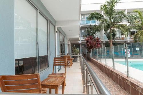 Bazén v ubytování Hotel El Aeropuerto nebo v jeho okolí