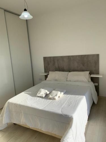 Ένα ή περισσότερα κρεβάτια σε δωμάτιο στο Newen Pinamar