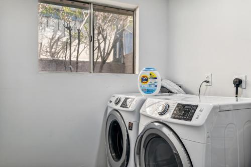 a washing machine in a room with a window at Phoenix Mountain Retreat in Phoenix