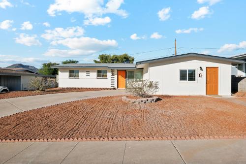 a house with a brick driveway in front of it at Phoenix Mountain Retreat in Phoenix