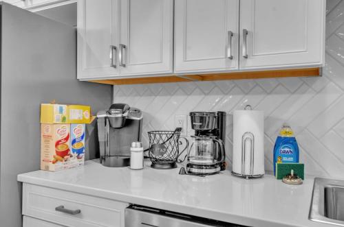 a kitchen counter with a coffee maker on it at Family townhouse with Fireplace in Ellicottville
