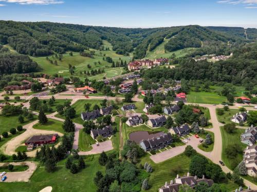 an aerial view of a village with houses and trees at Family townhouse with Fireplace in Ellicottville