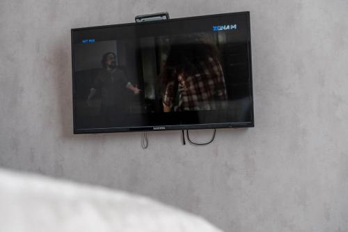 Un televizor și/sau centru de divertisment la Lovely apartment