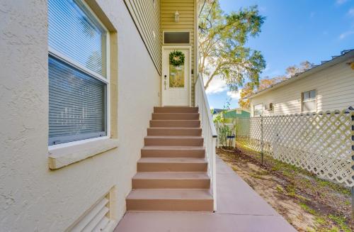 a stairway leading up to a white house at Weeki Wachee River Home on Main River by Park! in Spring Hill