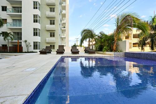 Bazén v ubytování Lujoso Apartamento con Vista a Playa de Boca Chica nebo v jeho okolí