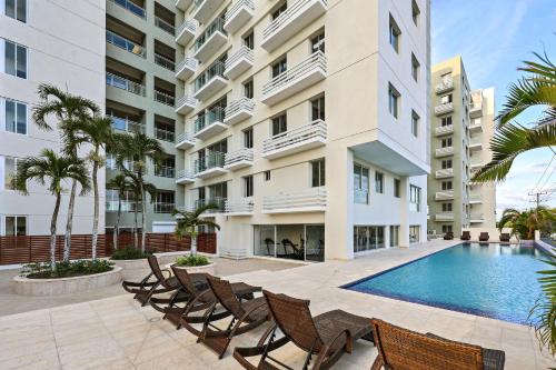 Bazén v ubytování Lujoso Apartamento con Vista a Playa de Boca Chica nebo v jeho okolí