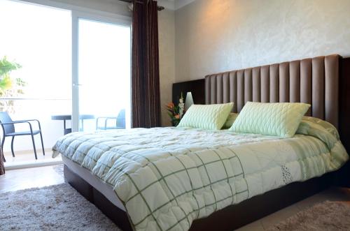 Postel nebo postele na pokoji v ubytování Hotel Chams