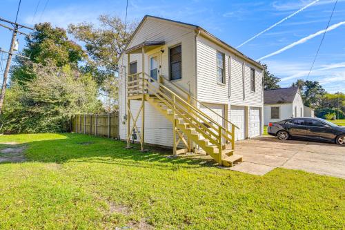 a house with a staircase on the side of it at Near Sabine Lake Pet-Friendly Apt in Port Arthur in Port Arthur