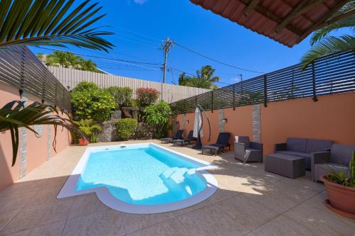Kolam renang di atau dekat dengan Villa PEARL, 3 chambres, piscine privée à Pointe aux Piments