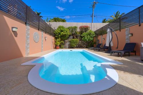 Kolam renang di atau dekat dengan Villa PEARL, 3 chambres, piscine privée à Pointe aux Piments
