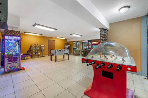 a room with a video game console in a store at Best Western Plus New Ulm in New Ulm