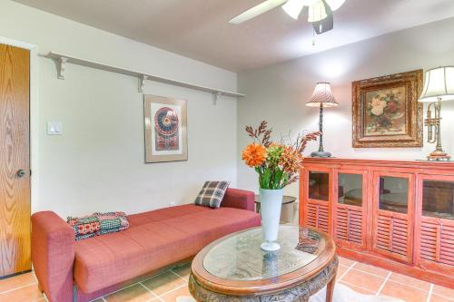 a living room with a couch and a table at Family Home on 30 Acres in Manvel! in Manvel