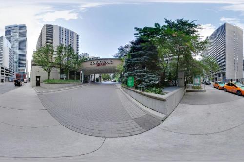 a street in a city with tall buildings at Courtyard by Marriott Toronto Downtown in Toronto