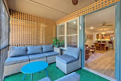 a living room with a couch and a table at Downtown Helen Walk To Shops And Restaurants in Helen