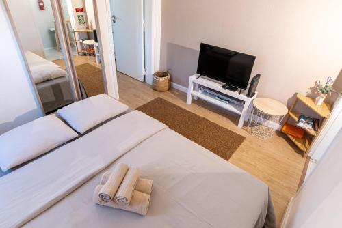 Et tv og/eller underholdning på O seu refúgio no coração de Belém