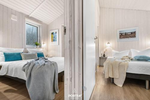 Postel nebo postele na pokoji v ubytování Ferienhaus Panoramablick 19 - Sankt Andreasberg im Harz
