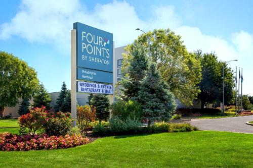 a sign that reads four points by convention at Four Points Philadelphia Northeast in Philadelphia