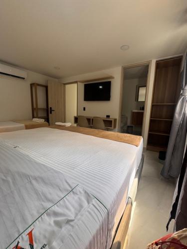 TV a/nebo společenská místnost v ubytování Vida Hostel