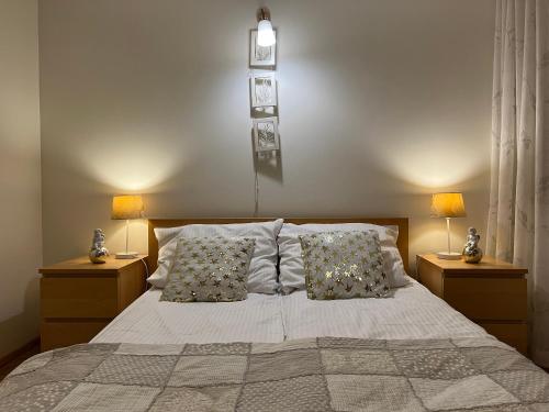 Posteľ alebo postele v izbe v ubytovaní Apartament Królewski Superior z sauną