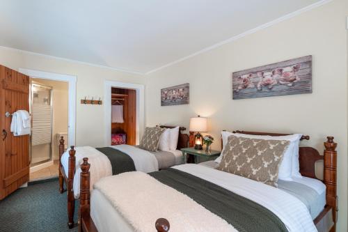 Ένα ή περισσότερα κρεβάτια σε δωμάτιο στο Tucker Hill Lodge